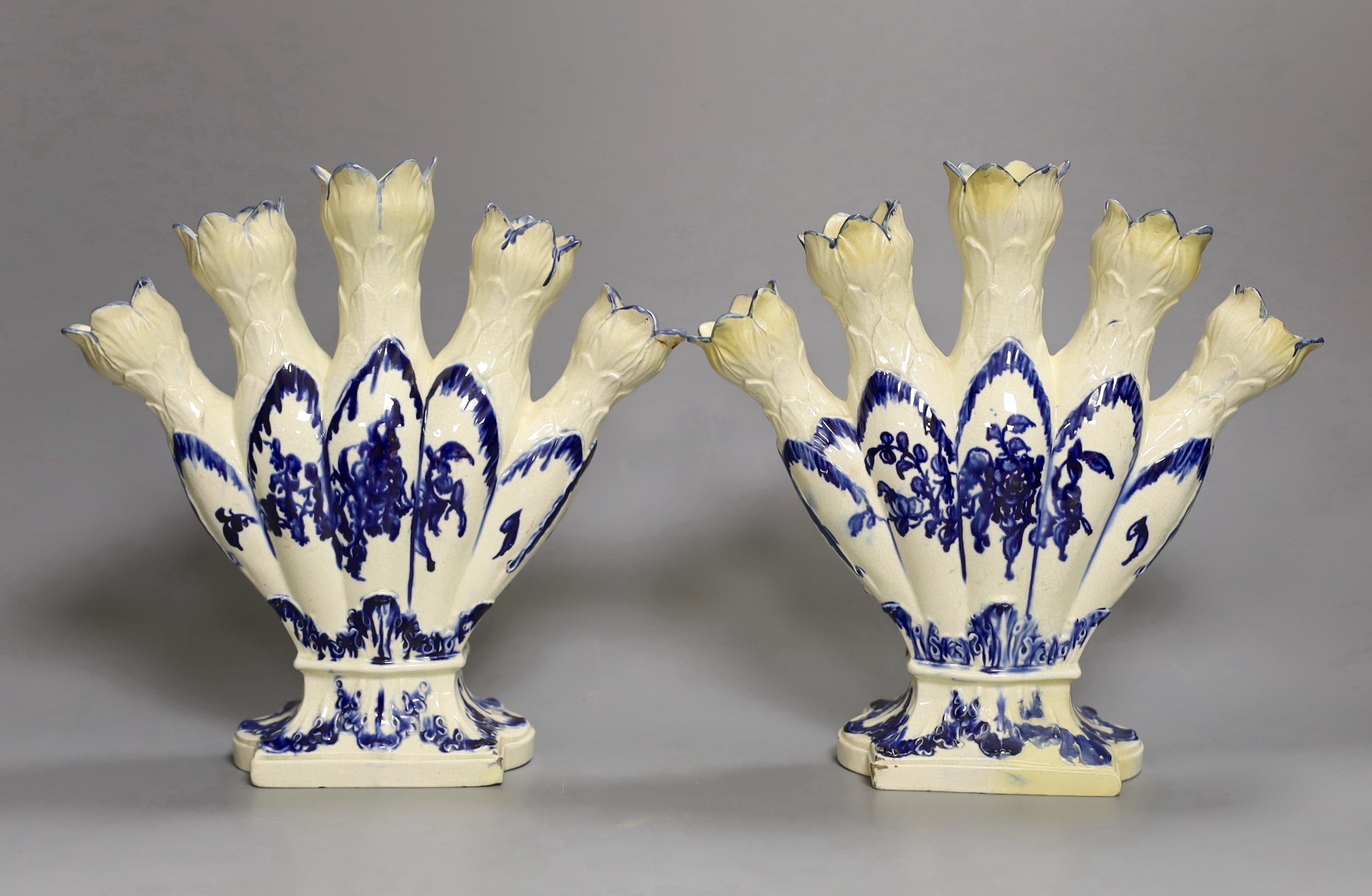 A pair of early 19th century Dutch Delft blue and white tulip vases, 22cm tall